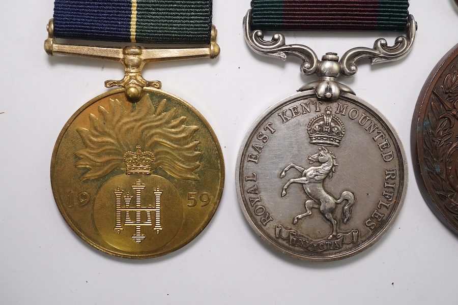 Four assorted medals; Royal East Kent Mounted Rifles Best Turned Out Troop 1901-1902-1903 Trooper Harrison; Medal for the Defence of Ookiep (reproduction); Honorable Artillery Company of London's Old Gunners Club medal t